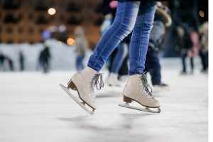 FEatured image showing a girl in figure skates at an outdoor ice skating rink